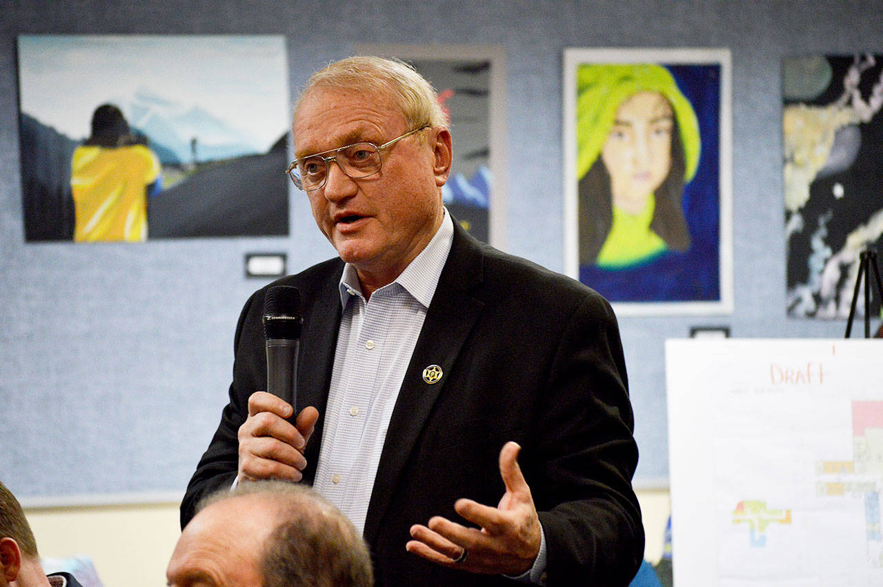 At a meeting Monday night, Island County Sheriff Mark Brown discusses the advantage of having a mental health crisis stabilization center and detox facility in Island County. These types of services are not available and deputies have to transport individuals to facilities in Burlington, Anacortes and Everett. Photo by Laura Guido/ Whidbey News Group