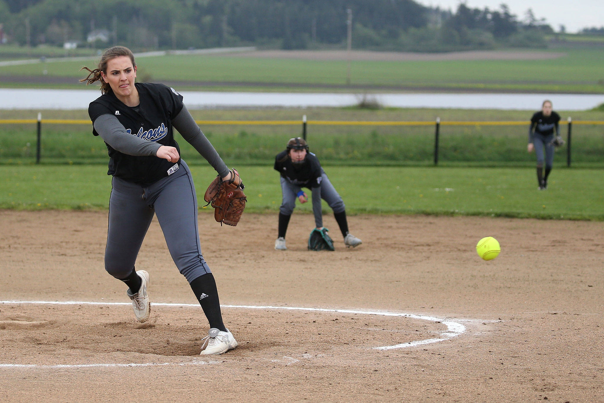 South Whidbey pitcher Mackenzee Collins fires a pitch in Fridays game with Coupeville.(Photo by John Fisken)