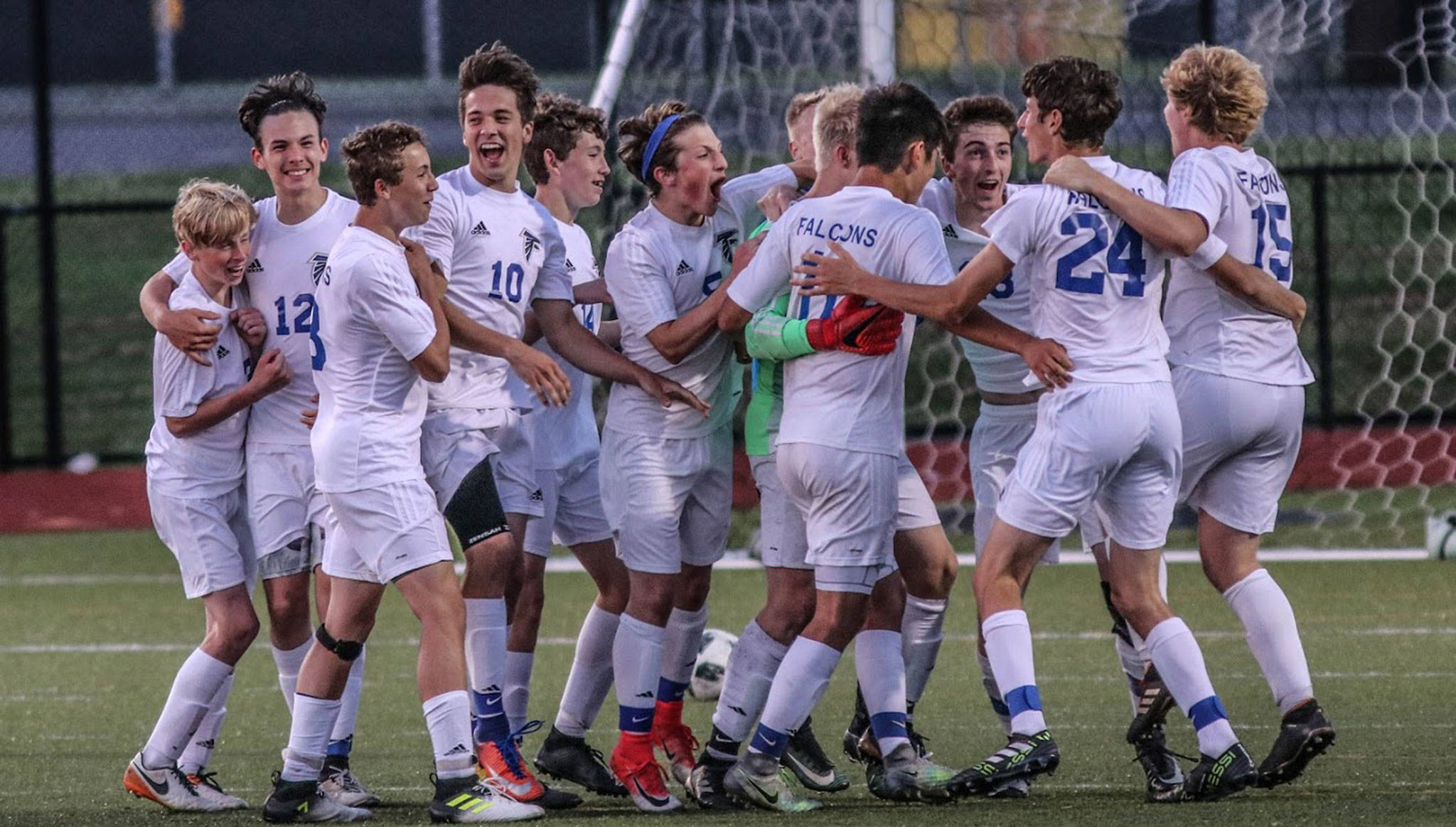 South Whidbey celebrates its win over Klahowya in the state tournament Tuesday.(Photo by Matt Simms)
