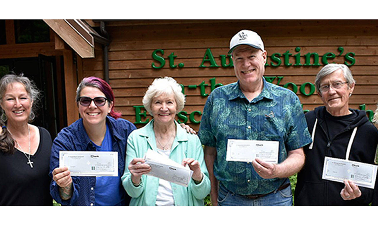 Photo provided                                Trash & Treasure chairwoman Susan Sandri (left), Mel Watson of Time Together, Jean Matheny of the Soup’s On soup kitchen, Charlie Vreeland of WAIF and Lynn and Jeff Nelsen of Healing Circles.