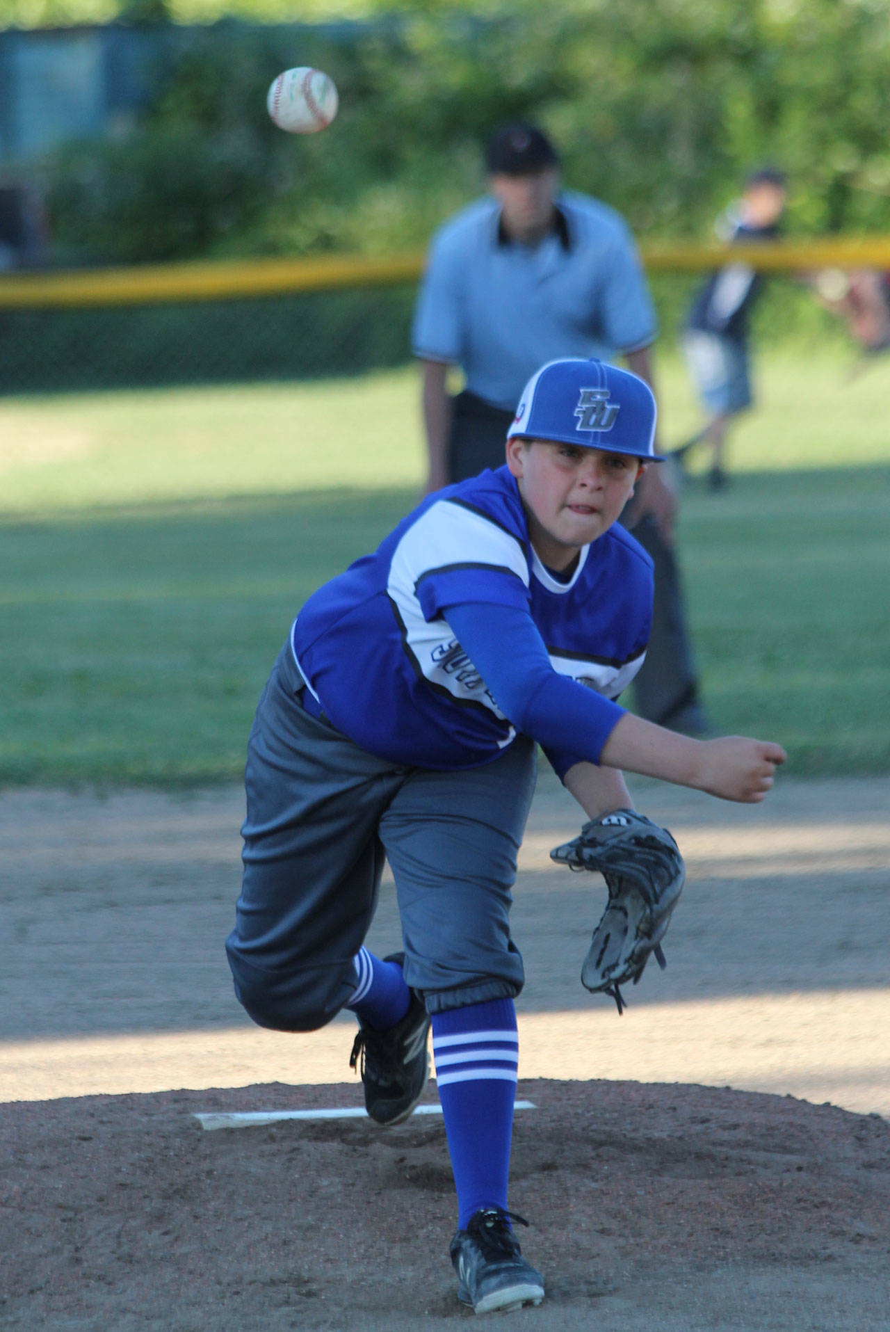 Liam Petty tosses a pitch against Sedro-Woolley Tuesday.(Photo by Jim Waller/South Whidbey Record)
