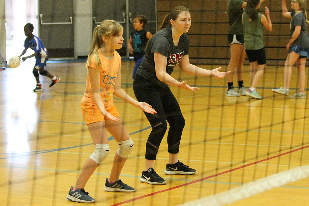 Players return to help with volleyball camp