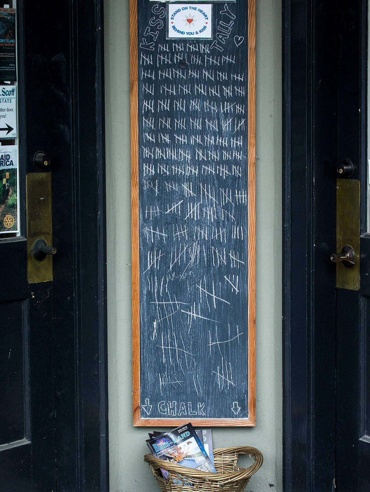 &lt;em&gt;Tally marks on the chalkboard in front of the John L. Scott Real Estate office in Langley get longer and messier the farther down they go.&lt;/em&gt;&lt;em&gt;&lt;/em&gt;