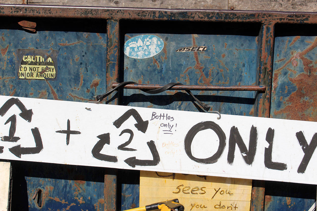 At Island Recycling in Freeland, the private company restricts accepting plastic to containers marked No. 1 and No. 2 only. Photo by Patricia Guthrie/Whidbey News Group