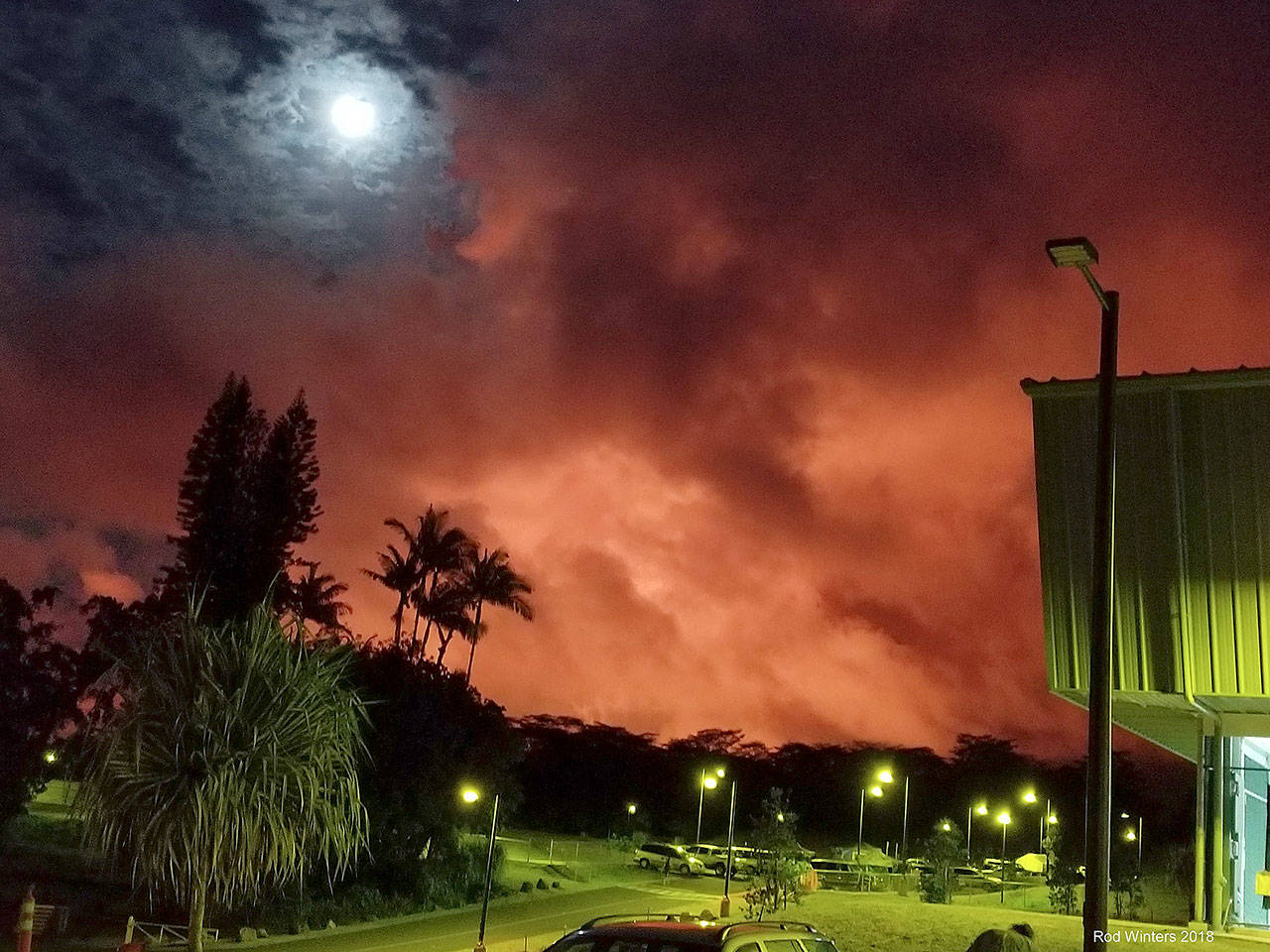 Photo by Rod Winters                                Bright volcanic smoke fills the sky at sunset over Pahoa, Hawaii.