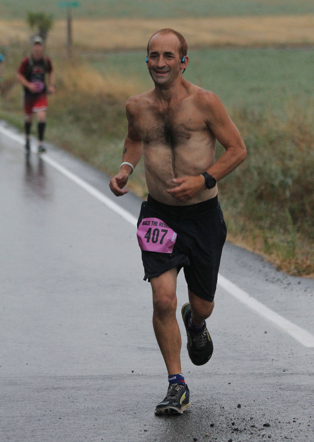 Clintons William Dolde runs to second place in the Race the Reserve marathon Saturday. (Photo by Jim Waller/South Whidbey Record)