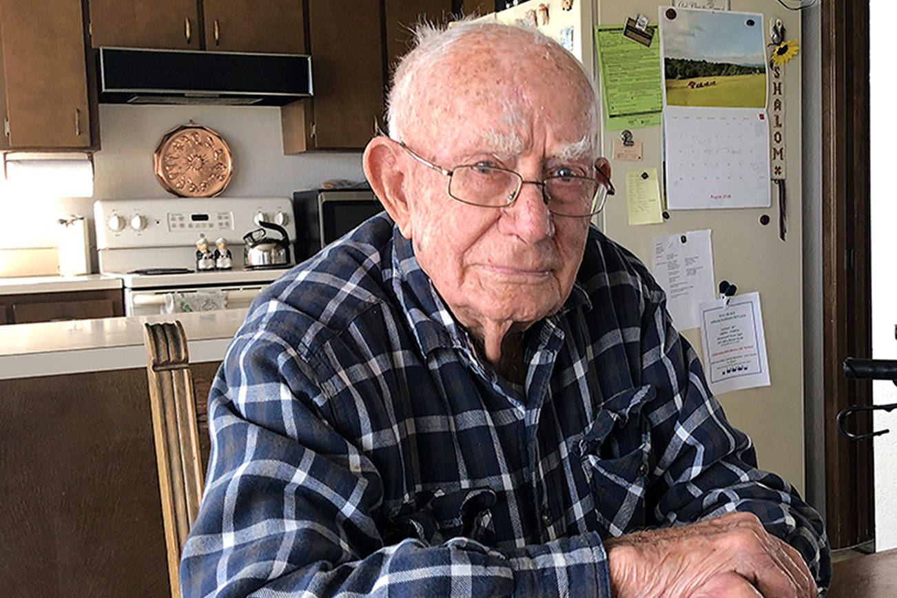 Photo by Emily Gilbert/ Whidbey News Group.                                Herbert Bacon has owned his house on Bells Beach Road in Langley since 1958 and turned 100 on Aug. 26.