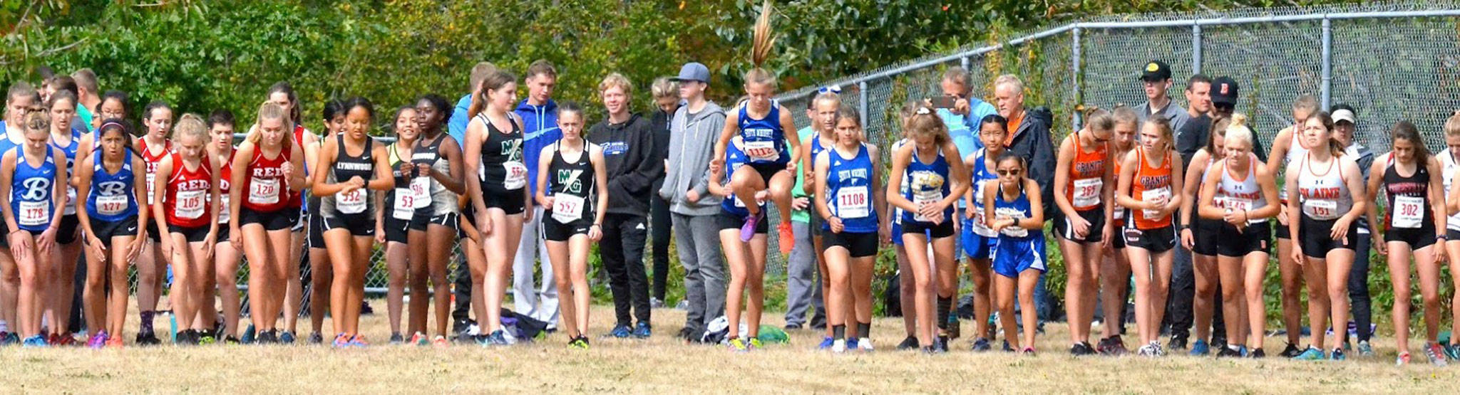 South Whidbeys Kaia Swegler Richmond is hopping to go at the start of the sophomore girls race Saturday. (Photo by Karen Swegler)