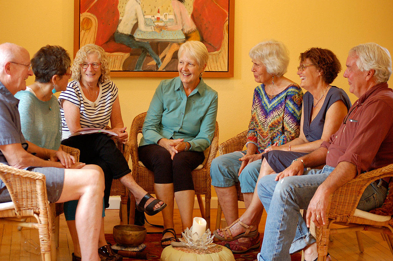Photo by Joan Soltys                                Healing Circles volunteer hosts, including Diana and Kelly Lindsay (far right) gather to talk about their circles.