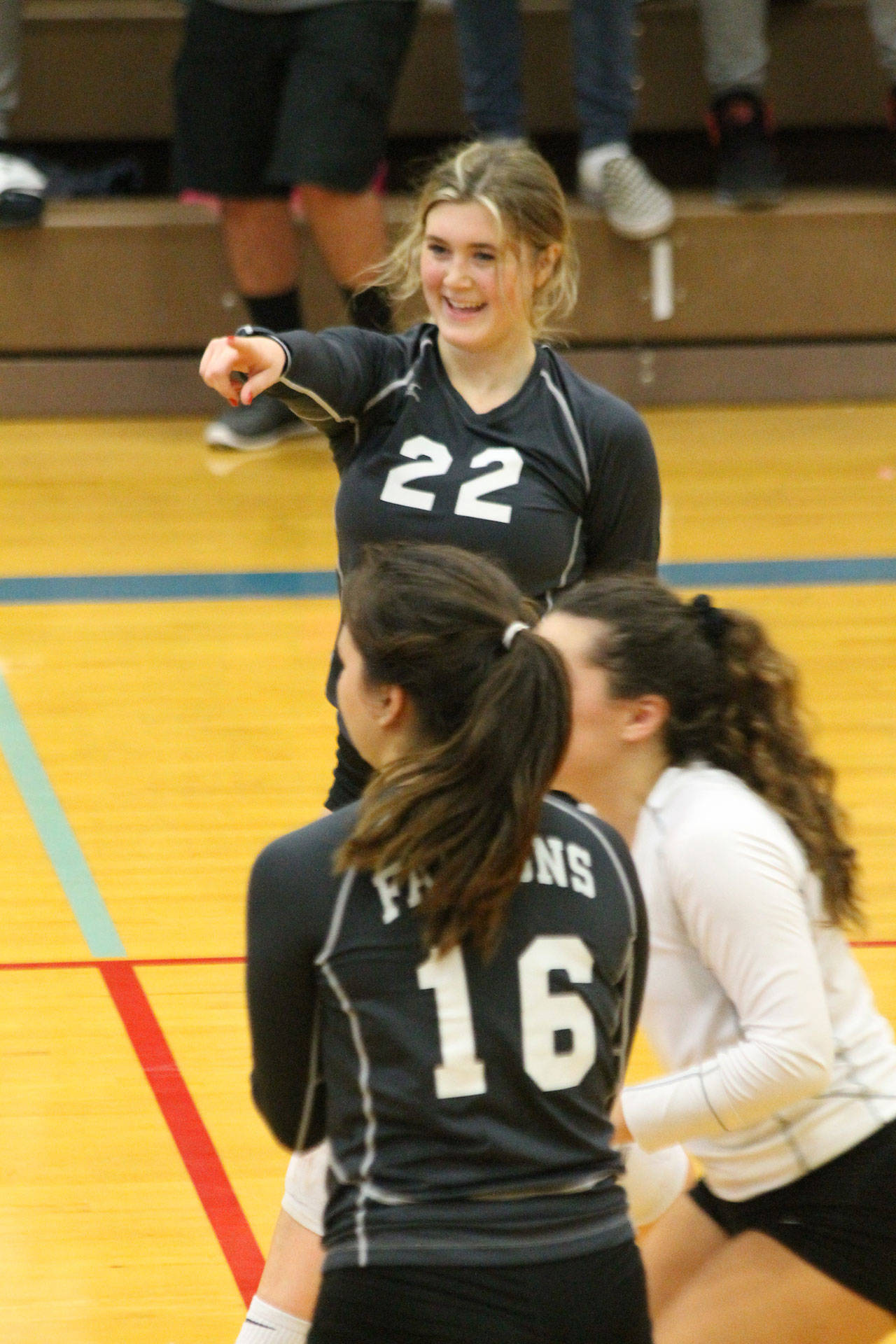 Chloe Johnson points to a teammate after her set led to a kill. (Photo by Jim Waller/South Whidbey Record)