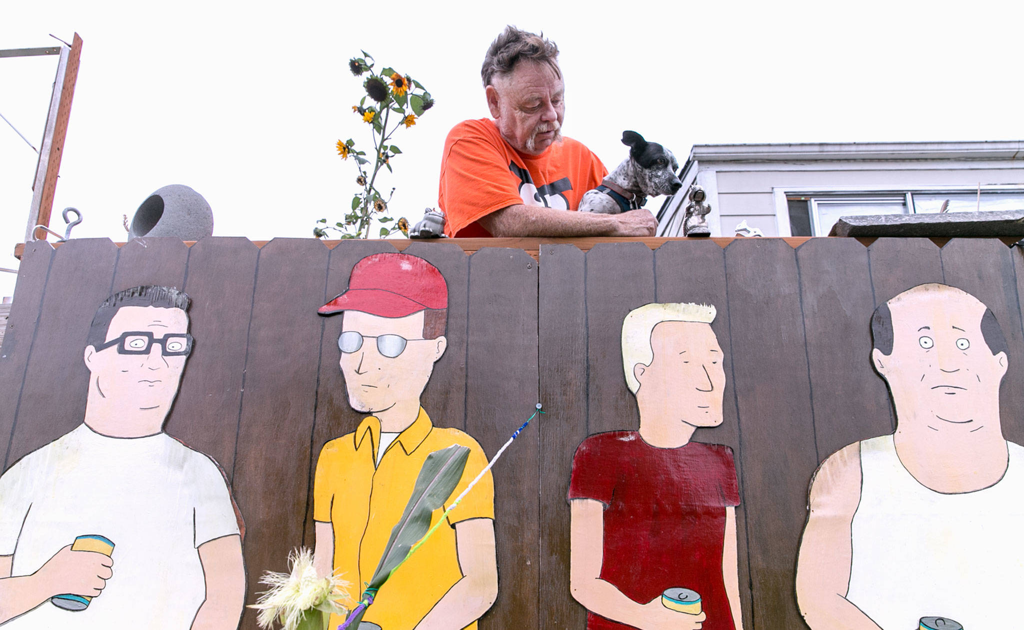 Kelly Hatley, 63, proudly displays characters from “King of the Hill” in his front yard in Freeland on Whidbey Island. (Kevin Clark / The Herald)                                Kevin Clark / The Herald.                                &lt;em&gt;Kelly Hatley, 63, proudly displays characters from “King of the Hill” in the front yard of his home in Freeland.&lt;/em&gt;