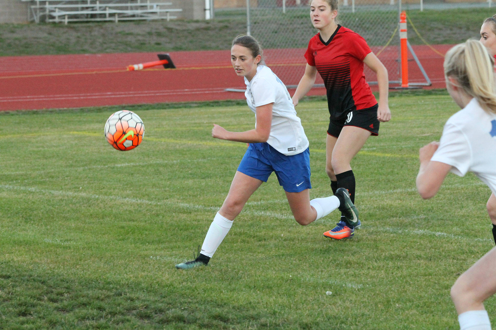 Ashley Ricketts runs down the ball in Mondays win over Coupeville. (Photo by Jim Waller/South Whidbey Record)