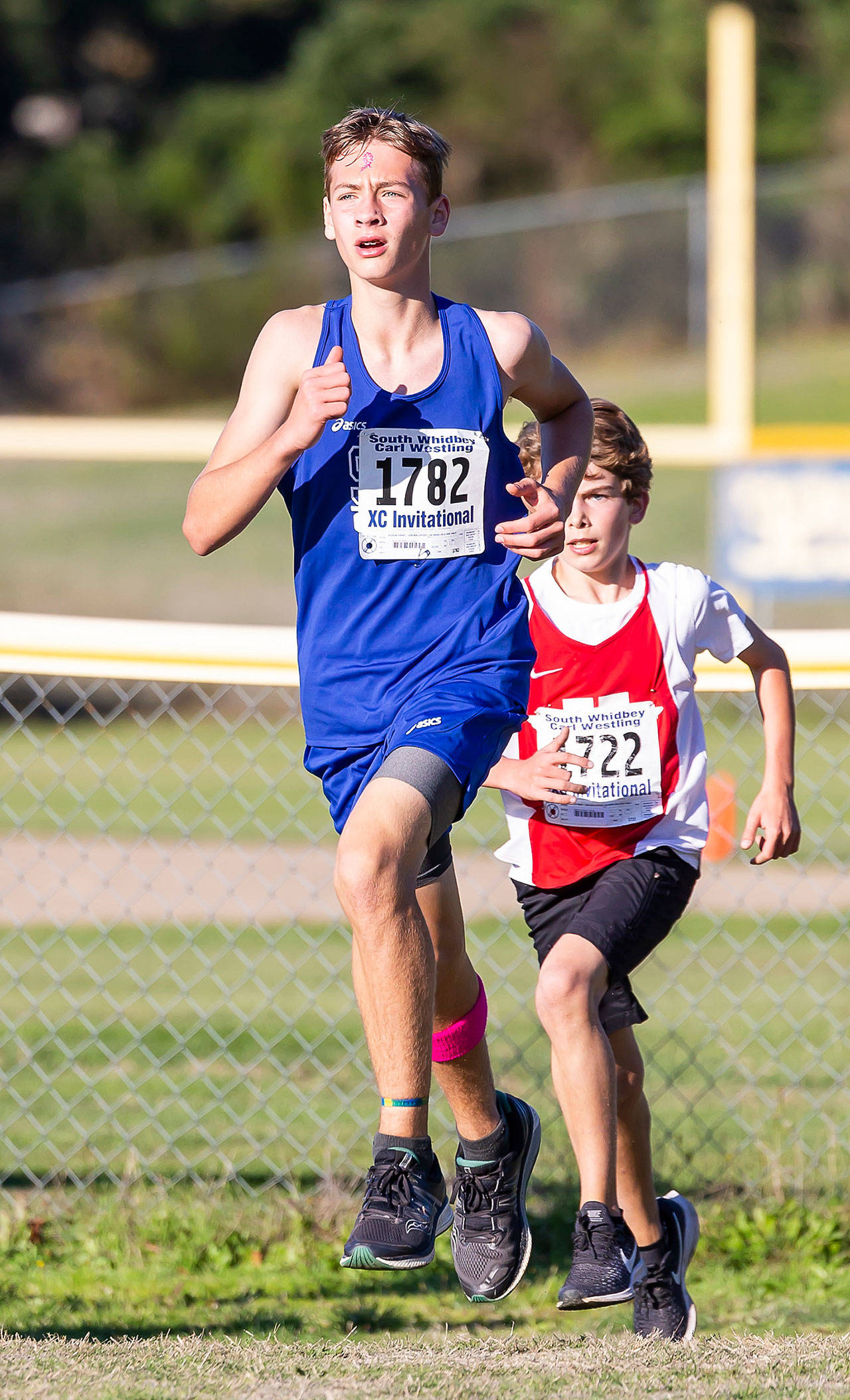South Whidbey’s Nicholas Muller pulls away to win the boys race.(Photo by John Fisken)