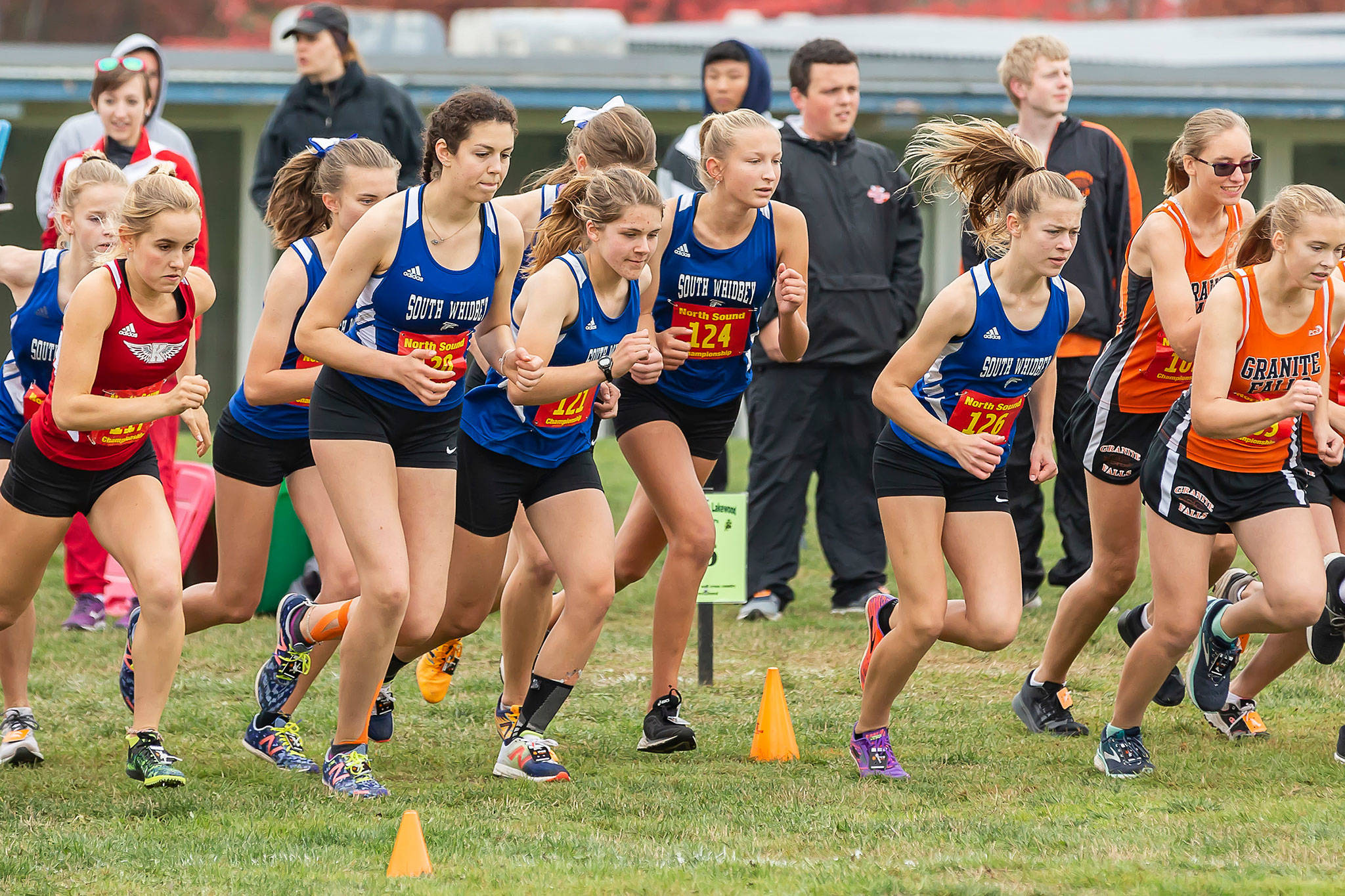 The South Whidbey girls take off at the beginning of the North Sound Conference Championships Saturday.(Photo by John Fisken)