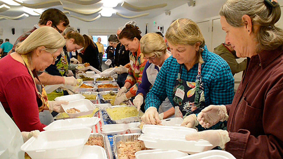 File photo                                It’s an assembly line of Thanksgiving spirit every year when volunteers with the Mobile Turkey Unit load up boxes of turkey meals to be delivered around South and Central Whidbey.
