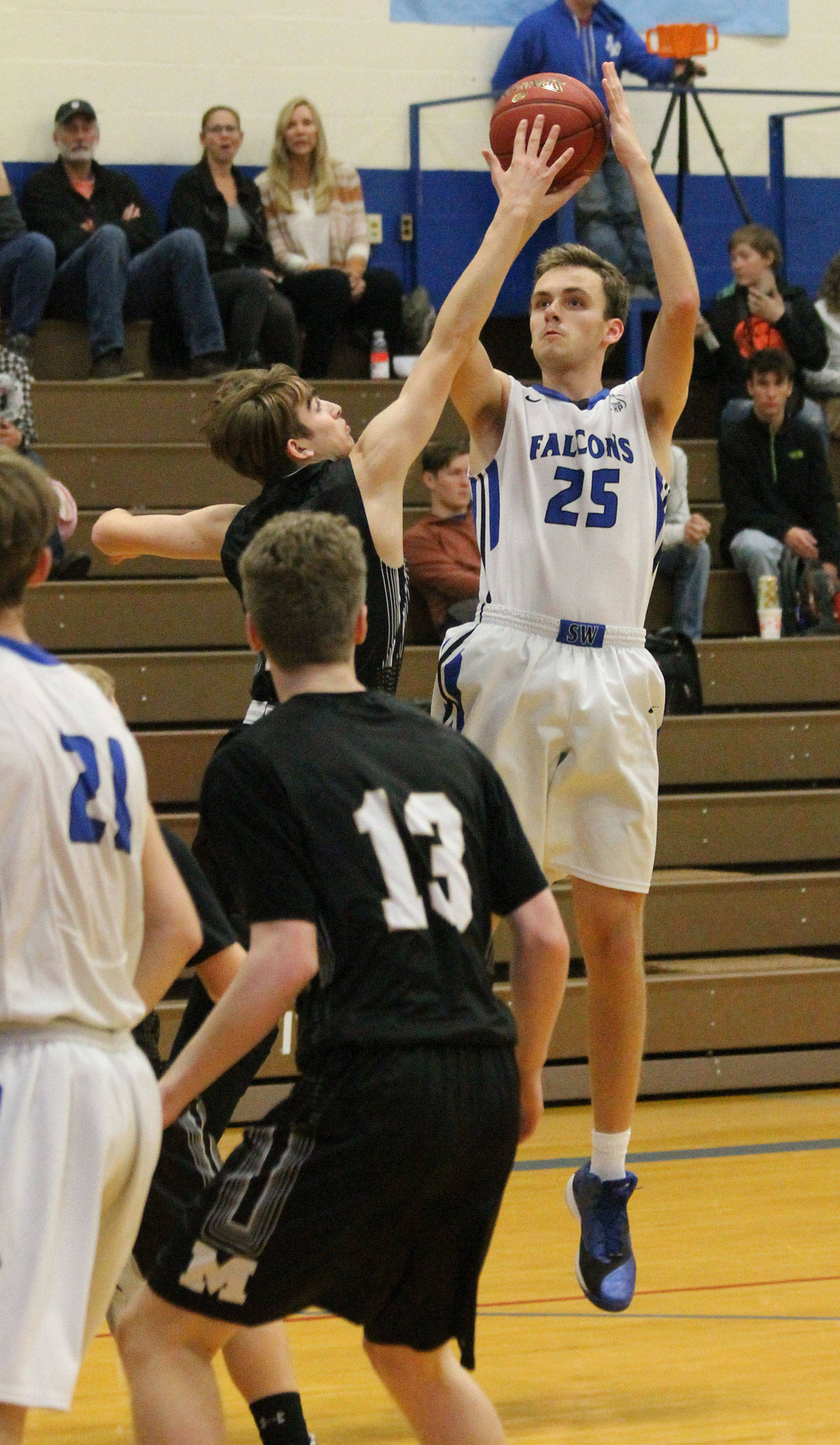 Levi Buck puts up a jumper in Tuesday’s game. (Photo by Jim Waller/South Whidbey Record)