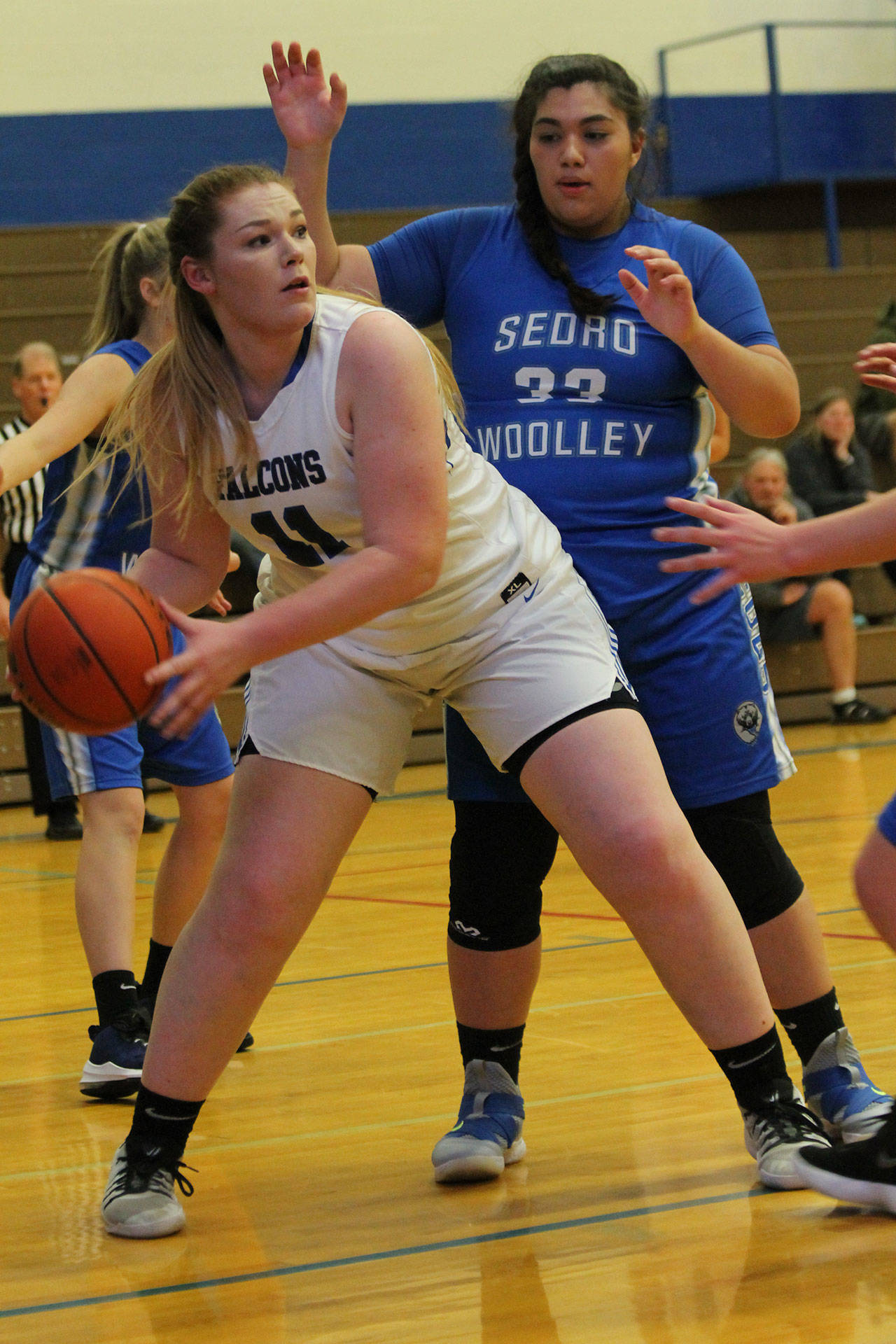 Lexi Starets-Foote (11) throws out of double team.(Photo by Jim Waller/South Whidbey Record)