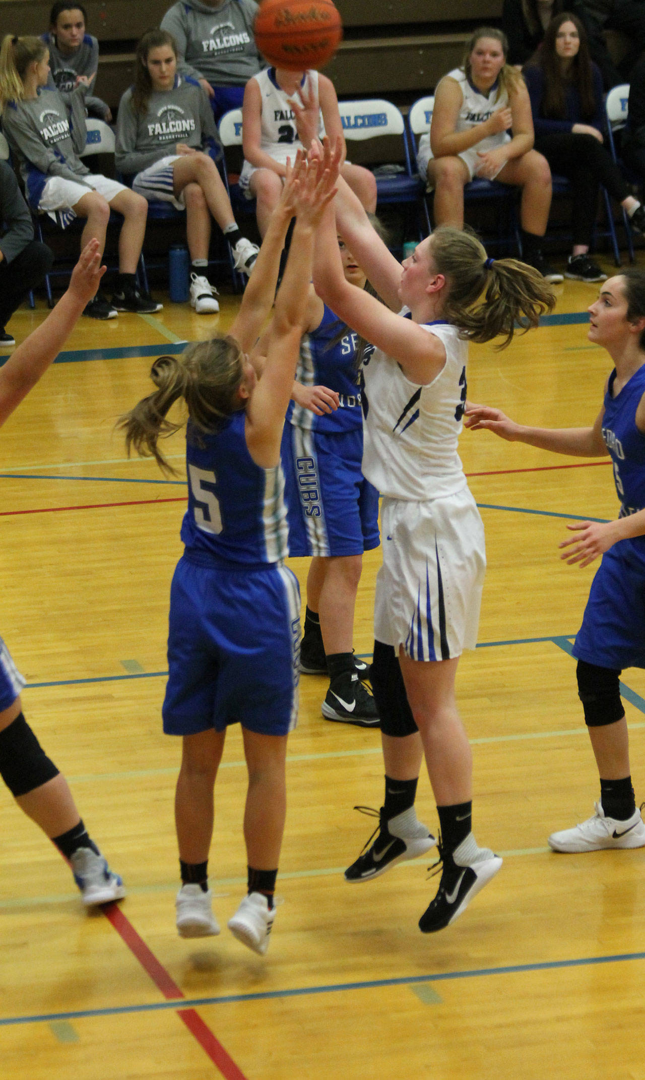 Emma Hodson puts up a jumper.(Photo by Jim Waller/South Whidbey Record)