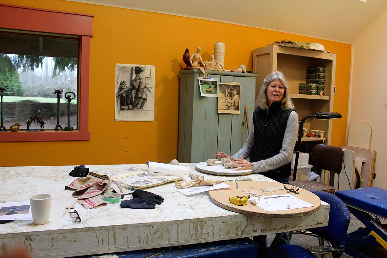 Georgia Gerber at her studio table where many of her animals and figures come to life from clay. (Photos by Patricia Guthrie/Whidbey News Group)