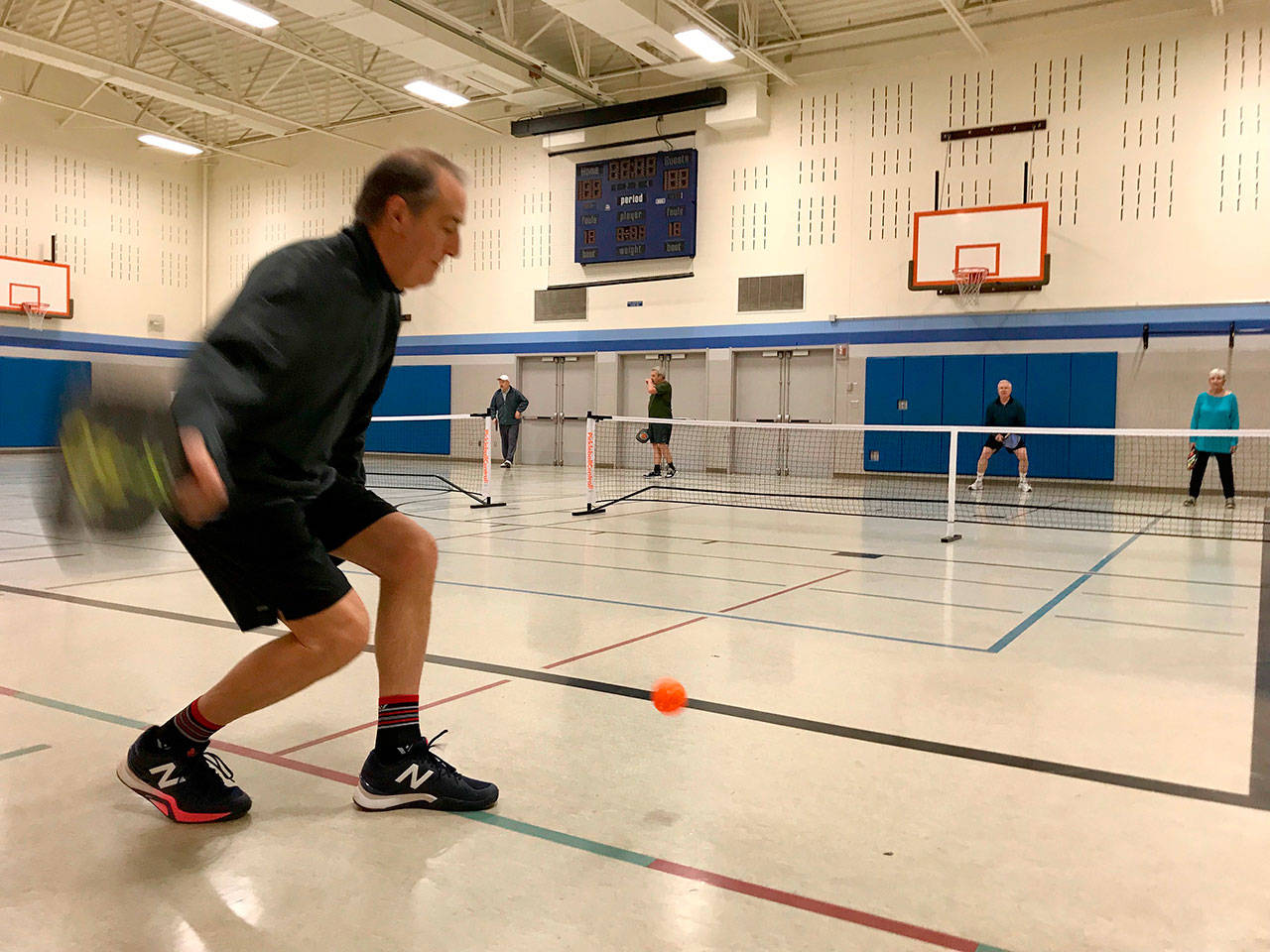 Twice a week, people signed up with South Whidbey Parks and Recreation program can play on pickleball courts in the gym of the South Whidbey Community Center. (Photo provided)