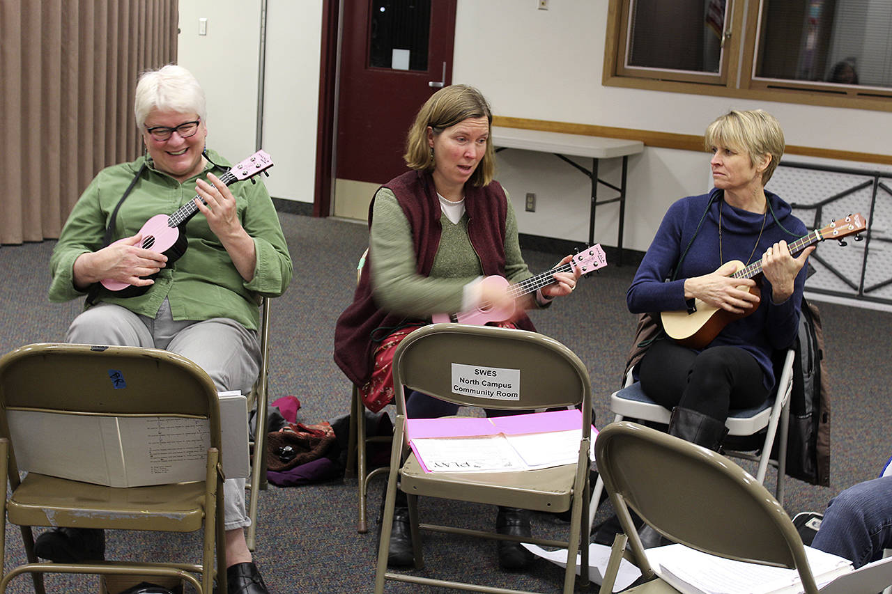 Rachel Kizer, left, Sarah Gillette and Valerie Brown talk about the challenges and rewards of learning to play the ukulele.