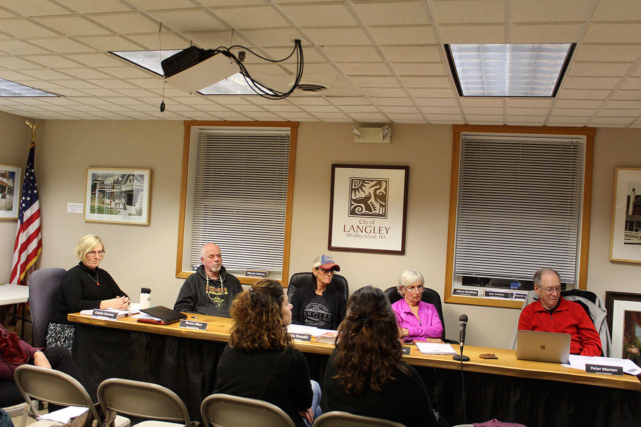 &lt;address&gt;&lt;em&gt;Langley city council members Christy Korrow, left, Bruce Allen, Ursula Shoudy, Dominique Emerson and Peter Morton discuss the 2019 budget for the city at Monday’s meeting. (Photo by Patricia Guthrie/Whidbey News Group)&lt;/em&gt;&lt;/address&gt;