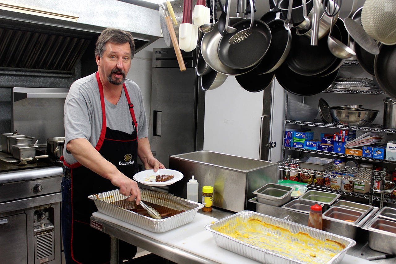 John Lutch cooks and leads the kitchen crew at South Whidbey American Legion Post 141. He’s been named Washington state “Volunteer of the Year ” by the Sons of the American Legion. (Photo by Patricia Guthrie/Whidbey News Group)
