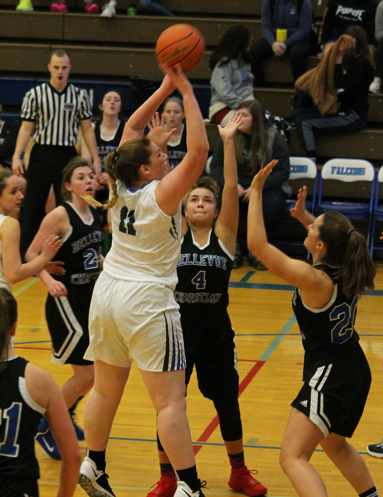 Lexi Starets-Foote fires up a jumper in Saturday’s game with Bellevue Christian.(Photo by Jim Waller/South Whidbey Record)