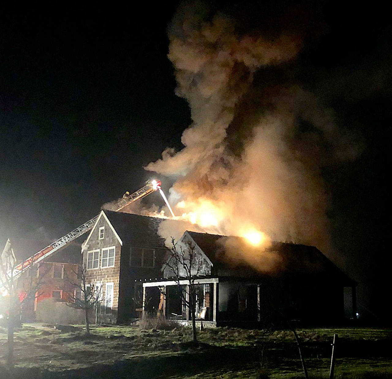 First responders work to extinguish a blaze Tuesday night at a residence on Shore Avenue. Photo provided