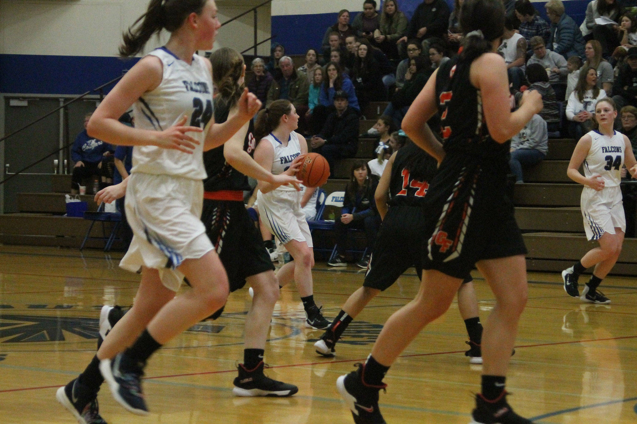 Kayla Knauer, center, leads South Whidbey on a break against Granite Falls Friday. (Photo by Jim Waller/South Whidbey Record)