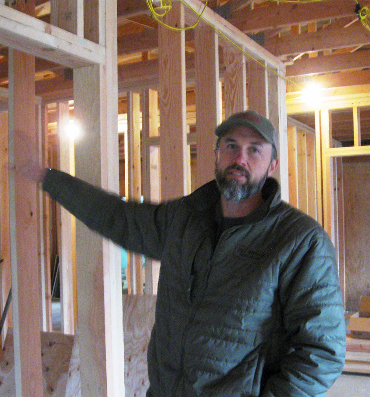 Photos by Dave Felice.                                General contractor Damon Arndt says the old Visser Funeral Home chapel is being remodeling as a multi-purpose room for general community use. General contractor Damon Arndt describes remodeling of old funeral home into Soundview Wellness Center.