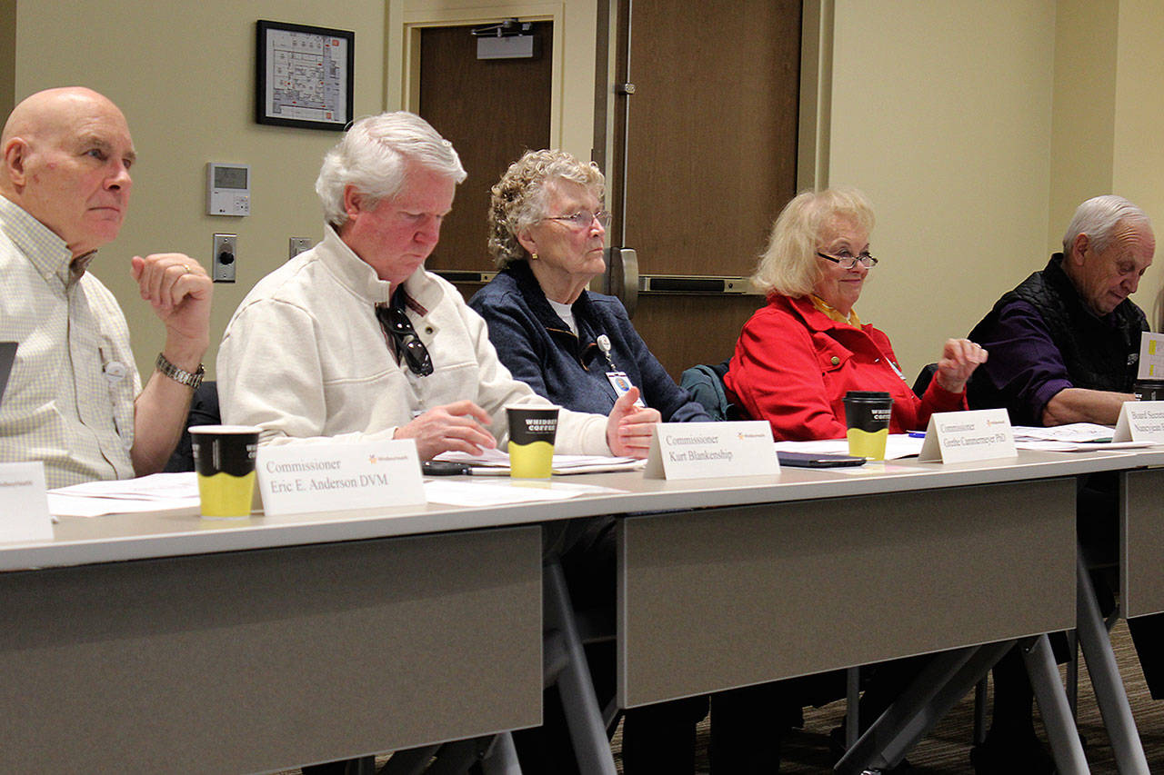 WhidbeyHealth board of commissioners, left to right, Eric Anderson, Kurt Blakenship, Grethe Cammermeyer, Nancy Fey and Ron Wallin, listen to a financial report at Monday’s board meeting. (Photo by Patricia Guthrie/Whidbey News Group)