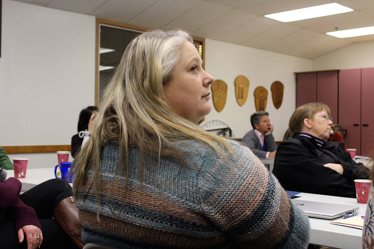 Lauri Johnson leads a discussion at a recent South Whidbey School District Board of Education workshop. Shes heading a new community coalition aimed at reducing student alcohol and drug use with a variety of proven strategies. (Photo by Patricia Guthrie/Whidbey News Group)