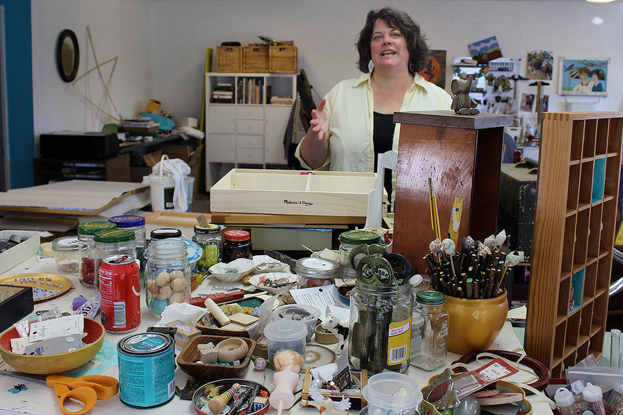 Potential pieces for assemblage art come from all over, says artist Sara Saltee. They could be trinkets of other people’s lives found at thrift stores and estate sales, shiny metal parts discovered in landfills and cool stuff found by friends who are always on the look out for “shrine worthy” objects. (Photo by Patricia Guthrie/Whidbey News Group)