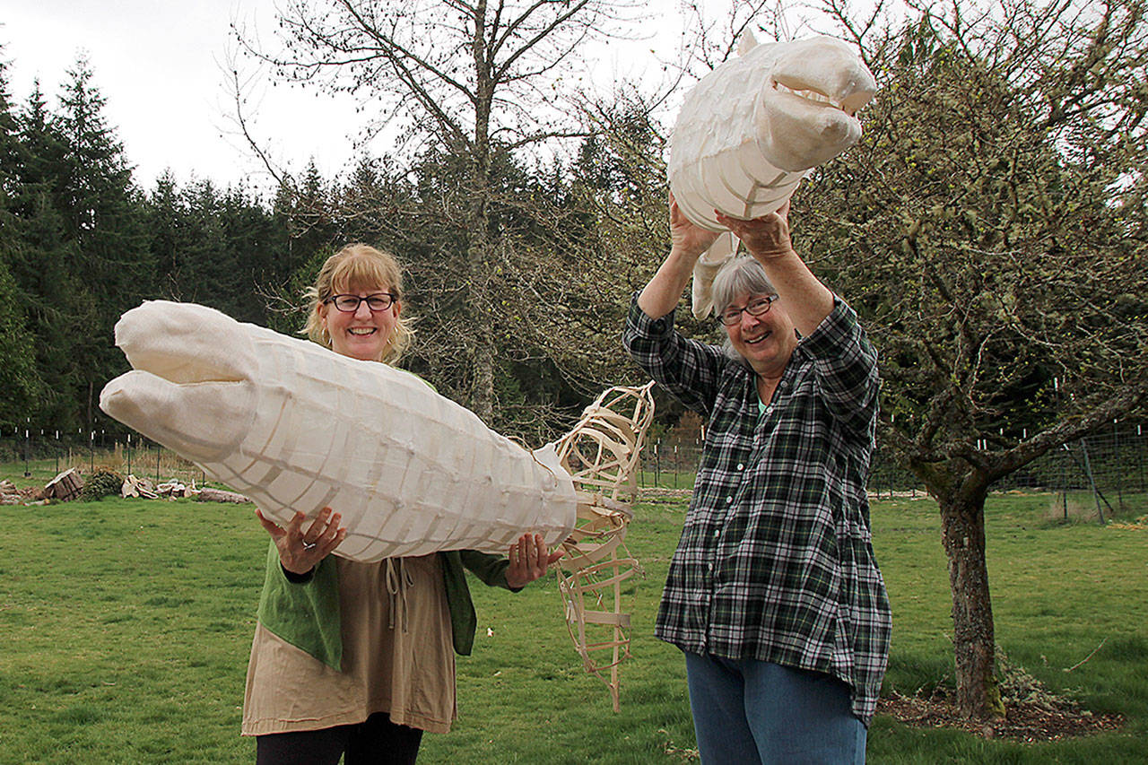 Artists Melissa Koch (right) and Molly Brown look forward to creating more salmon for a bigger school of fish. (Photos by Maria Matson/Whidbey News Group)