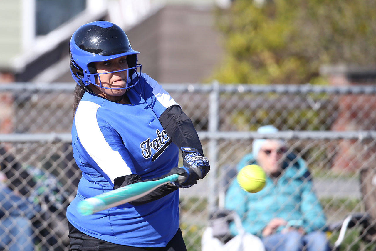 Arianna Briggs attacks a pitch against Coupeville Tuesday.(Photo by John Fisken)