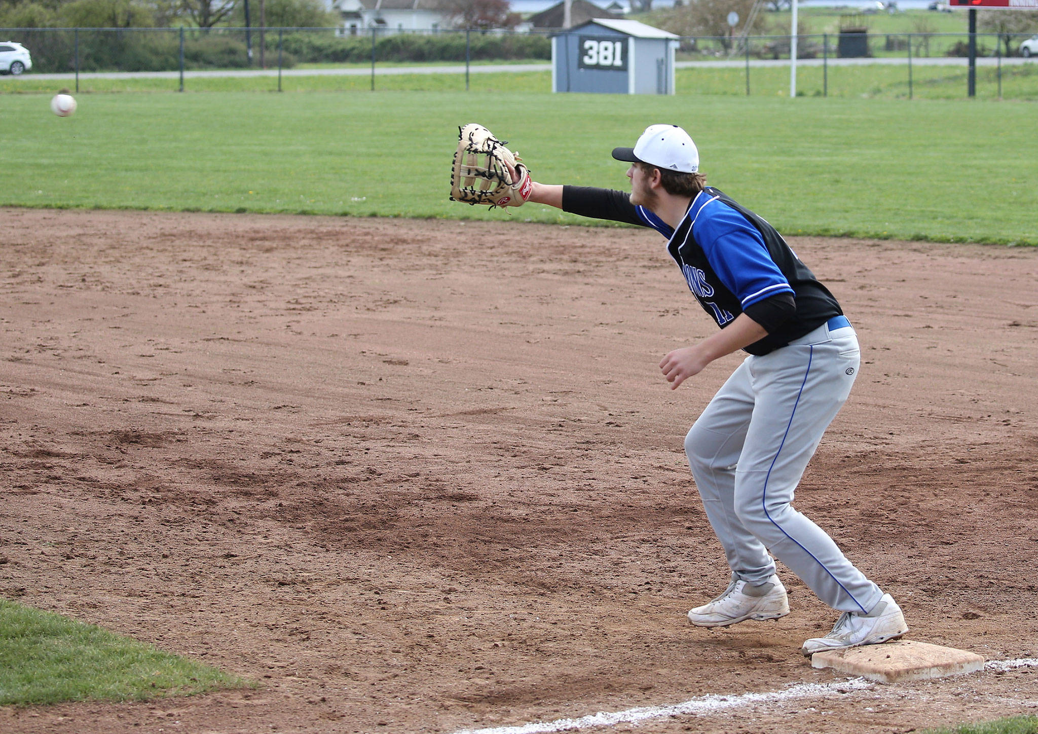 Falcon first baseman Brent Batchelor receives a throw for an out.(Photo by John Fisken)