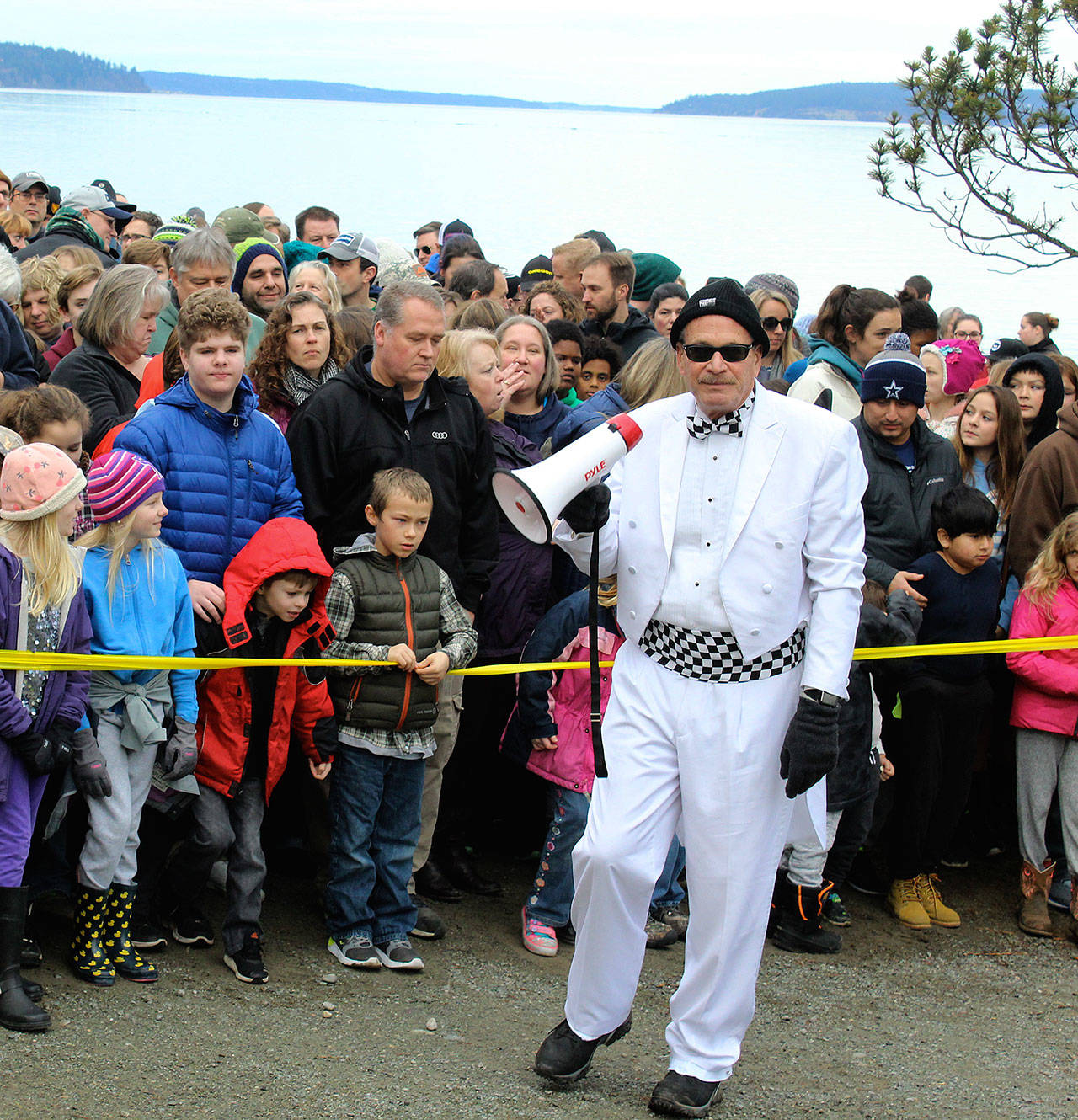 Langley Mayor Tim Callison said he plans to seek another term in Novembers general election. For events, such as this years Sea Float Scramble, Callison always wears a white tuxedo with a changing collection of cummerbunds and accessories. (Photo by Patricia Guthrie/Whidbey News Group)