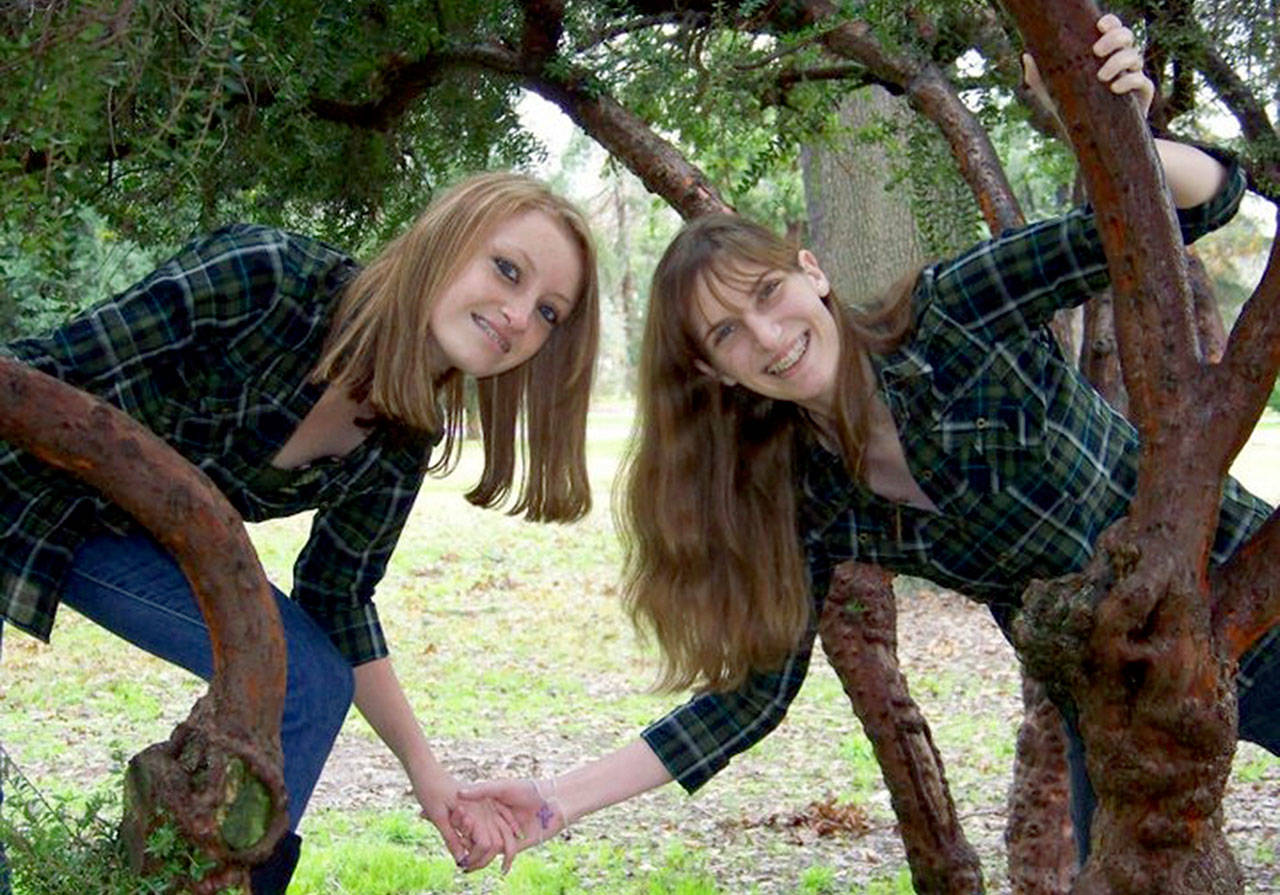 Emma Cunningham (left) with her sister, Katherine. They grew up together in Merced County, California. (Cunningham family)