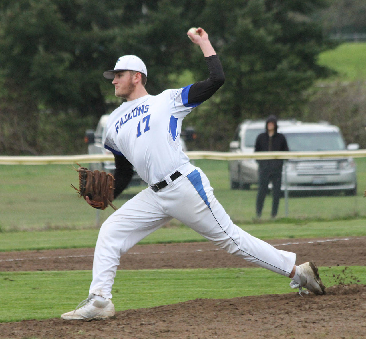 Brent Batchelor fires a pitch while earning a save with a perfect seventh.(Photo by Jim Waller/South Whidbey Record)
