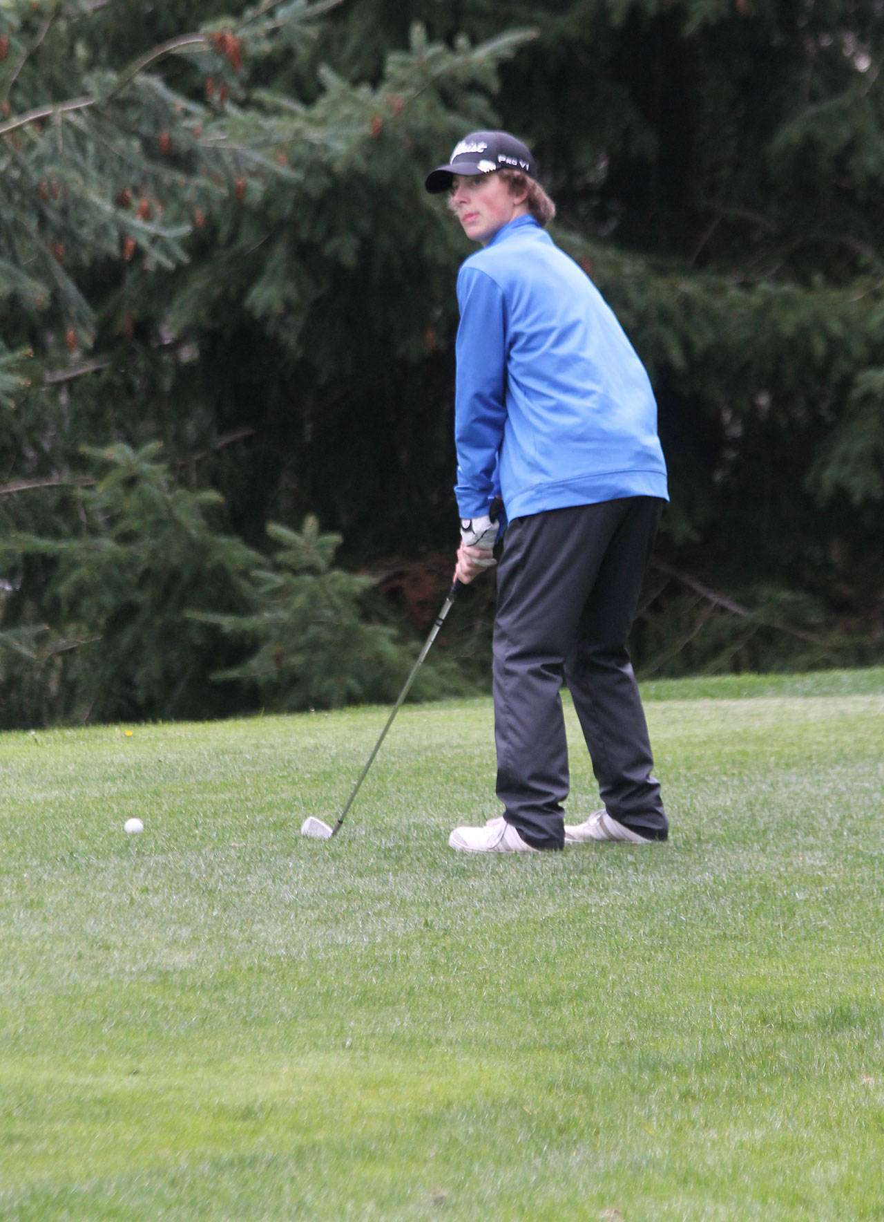 Dane Saxton lines up a shot.(Photo by Jim Waller/South Whidbey Record)