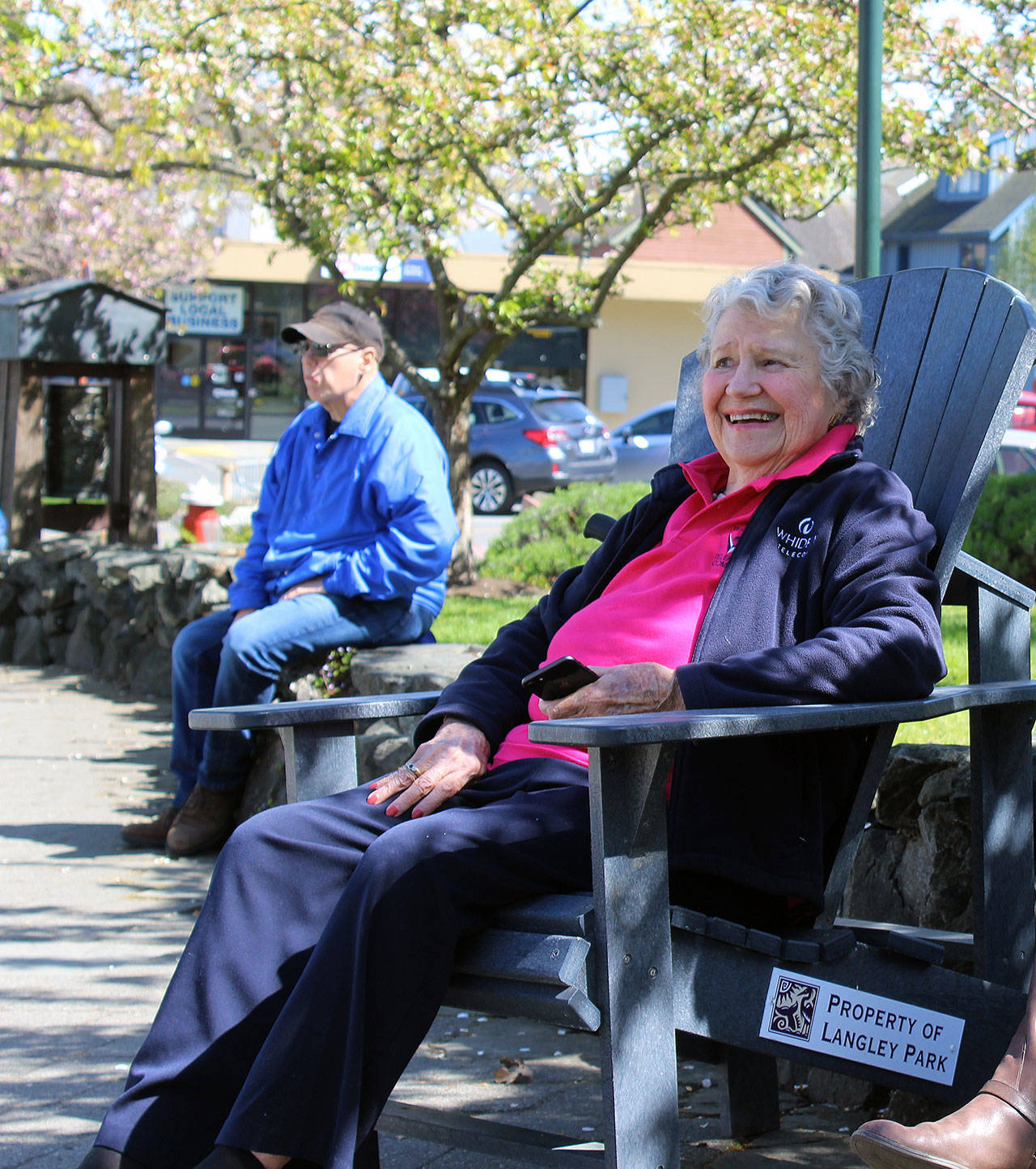 Marion Henny couldn’t stop smiling Tuesday as she watched her company’s original telephone center return to downtown Langley. (Photo by Patricia Guthrie/Whidbey News Group)