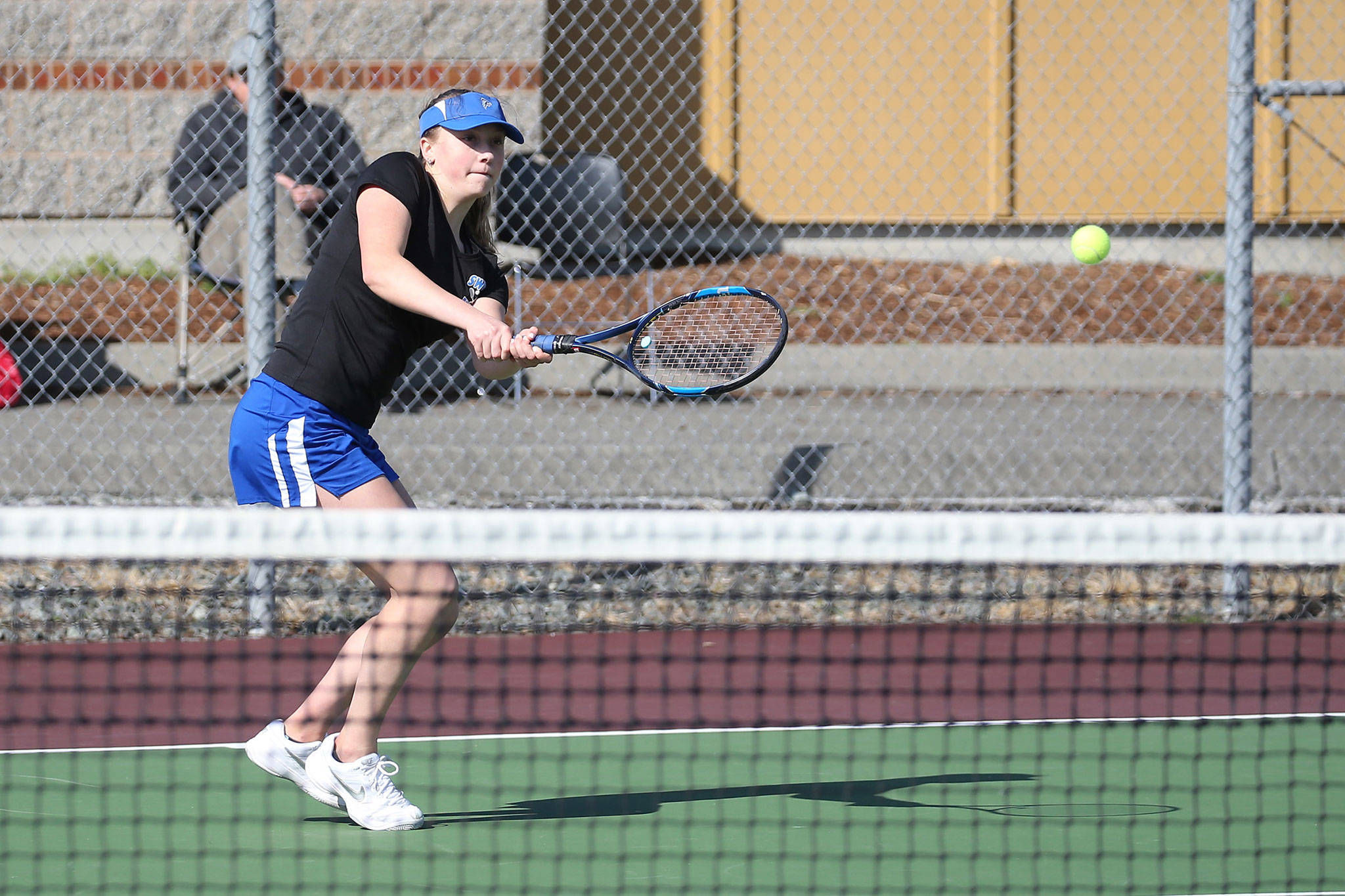 Mary Zisette, shown here in a match at Coupeville earlier this season, won the North Sound Conference/District 1 doubles title with partner Alison Papritz this week. (Photo by John Fisken)