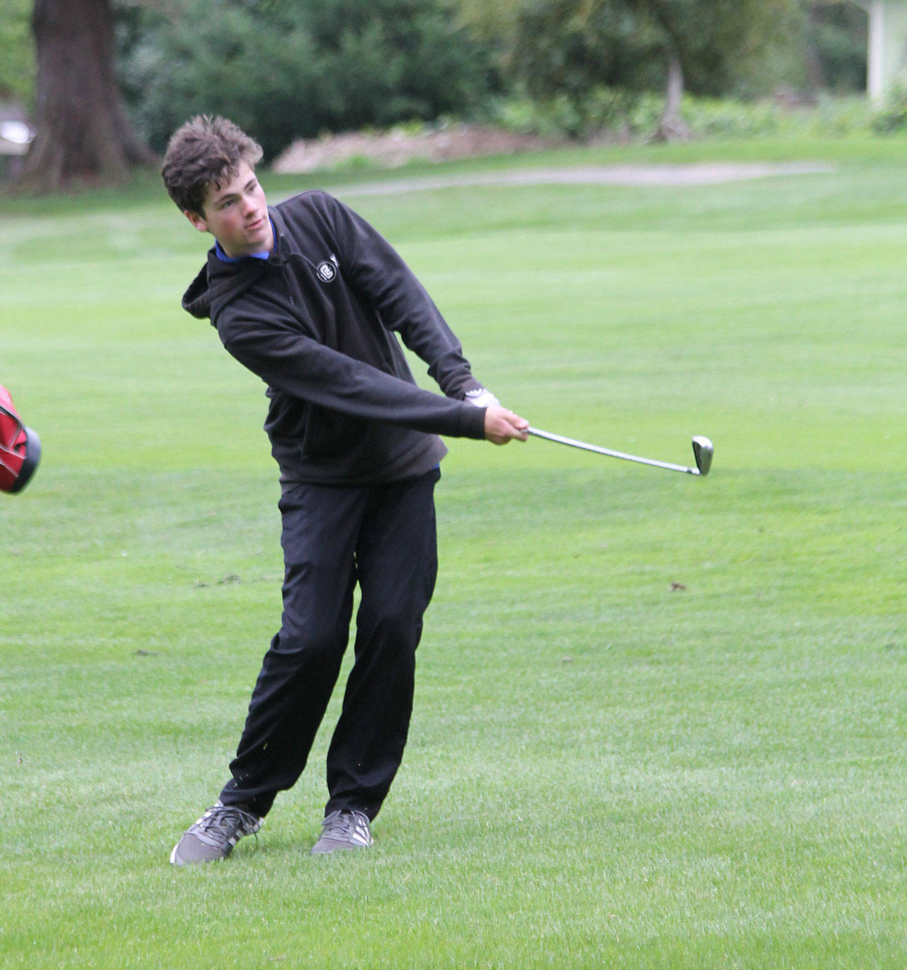 South Whidbey’s Gabe Jacobson-Ross, shown here in a match earlier this season, placed 26th in the state 1A golf tournament this week. (Photo by Jim Waller/South Whidbey Record)