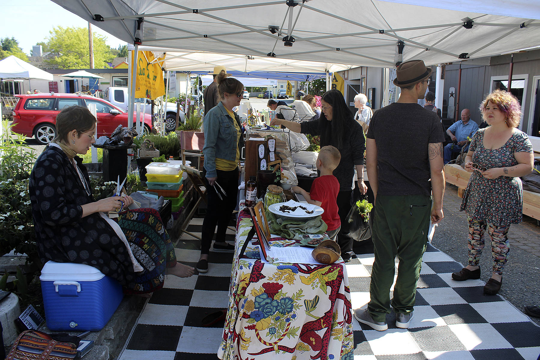 Photo by Patricia Guthrie/Whidbey News Group                                The Langley Farmers Market opened in a new location, day and time recently. It sets up from 2 to 6 p.m. every Thursday in Frick Alley near the Star Store parking lot.