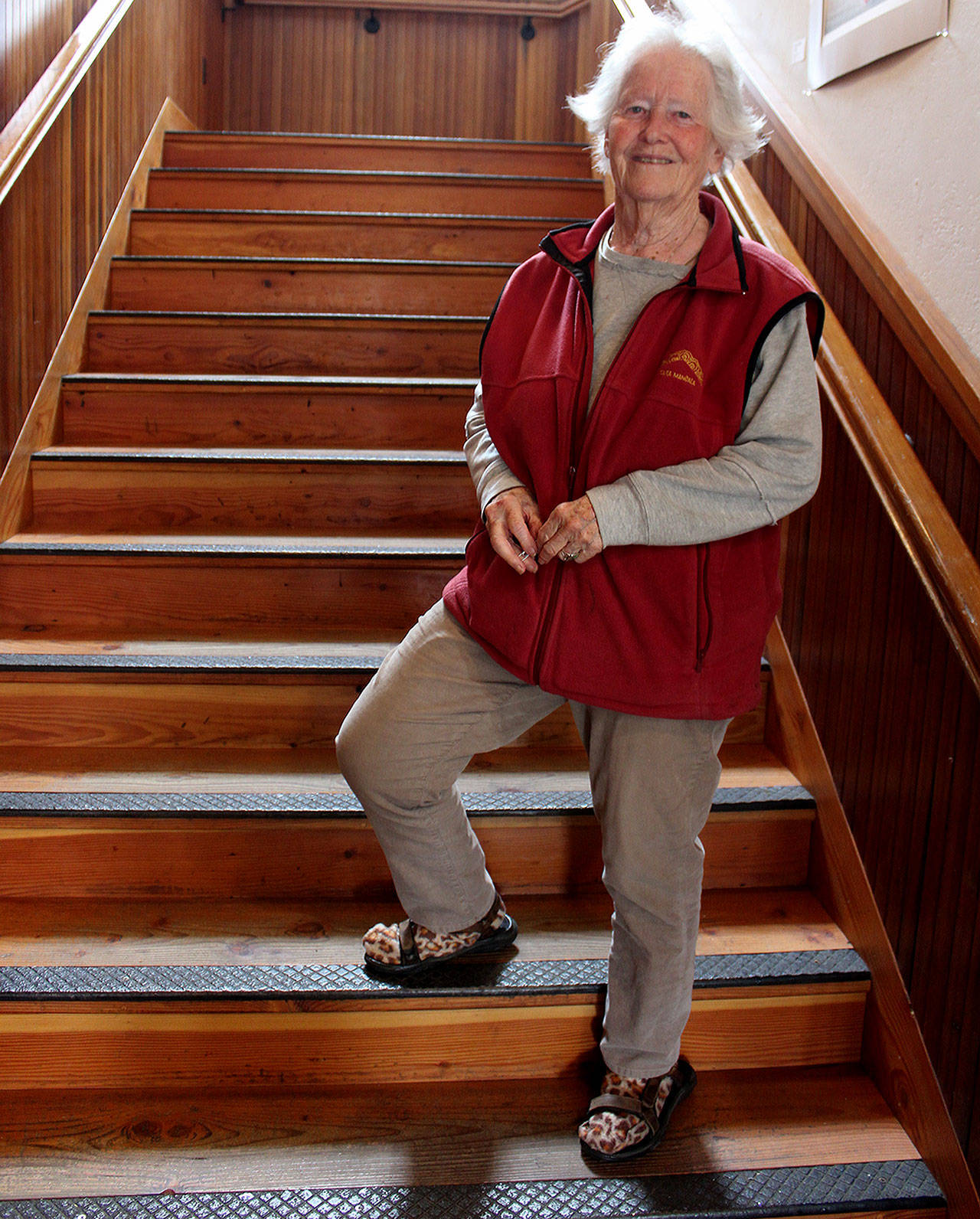 Nancy Nordhoff stands on the steps of the Bayview Cash Store, the historic building she saved and renovated 20 years ago. It was the beginning of Goosefoot, a nonprofit thats funded dozens of community organizations and projects over the years. Photo by Patricia Guthrie/Whidbey News Group