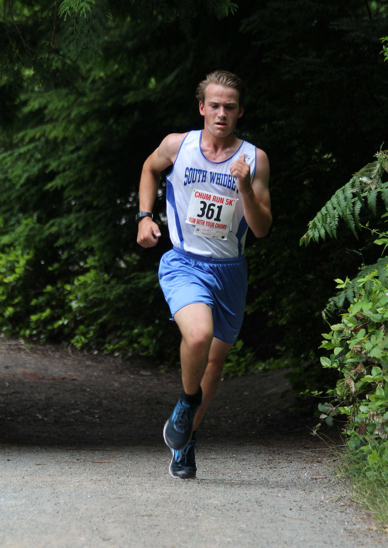 Michael Cepkowski, the Chum Run’s top finisher, zips through the course. (Photo by Jim Waller/South Whidbey Record)