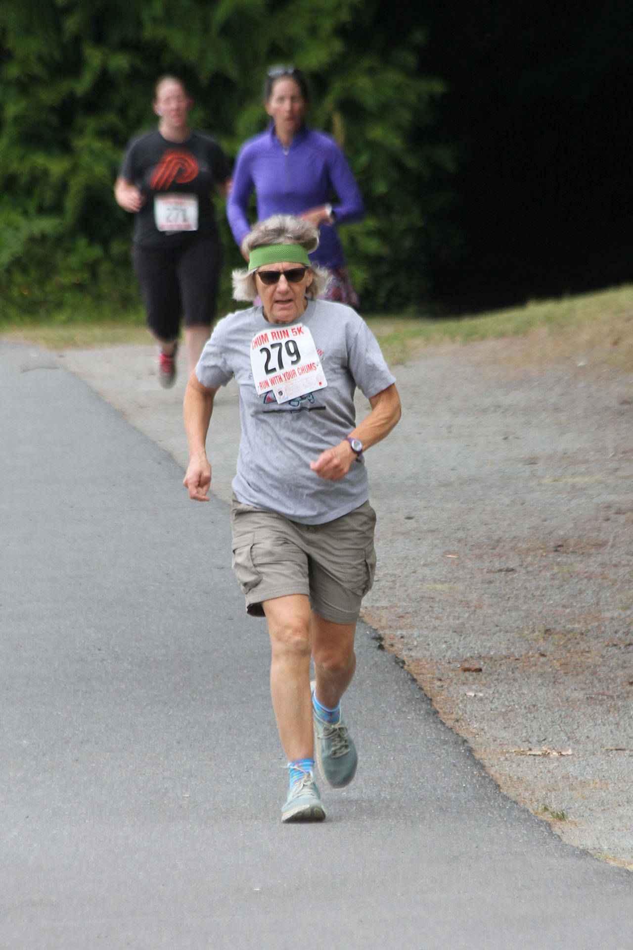 Beth Johnson hustles along the course. (Photo by Jim Waller/South Whidbey Record)