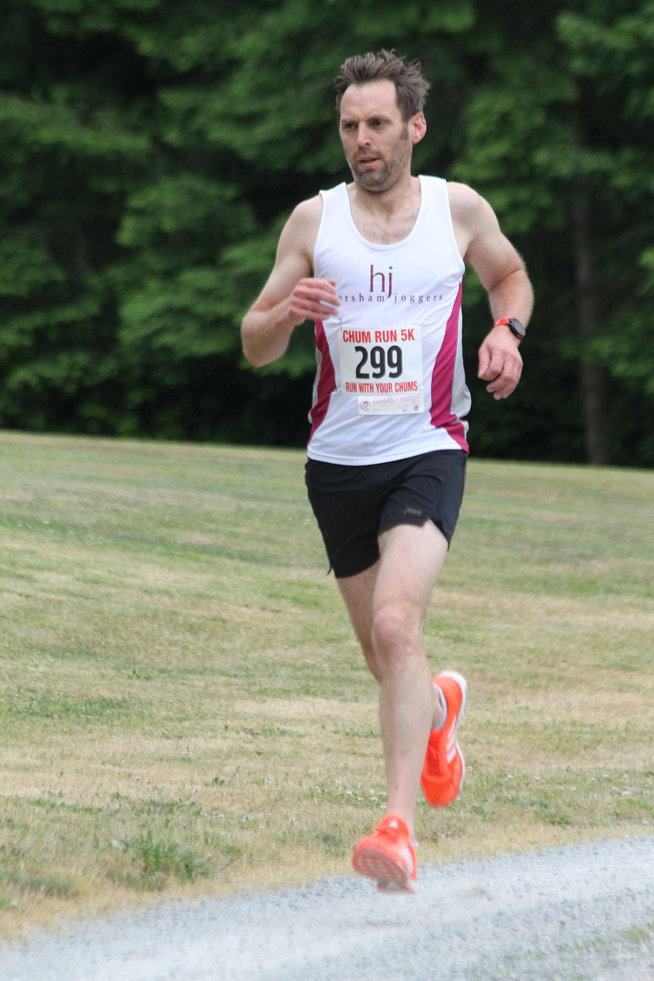 Alistair McLachlan runs to second place in the Chum Run.(Photo by Jim Waller/South Whidbey Record)