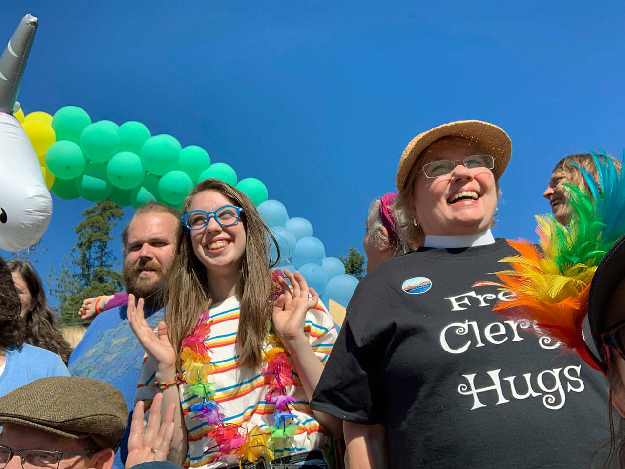 At the LGBTQ-supportive Langley Pride Picnic, community members gathered for food, music, art crafts and dancing. Above, St. Stephen’s Episcopal Oak Harbor’s Rev. Diana Peters wears a shirt that says “free Clergy hugs.” (Photos provided)